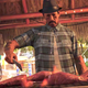 A screenshot of Danny Trejo chopping up and grilling some meat for tacos.
